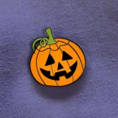 XA36 Pumpkin Needleminder on purple linen